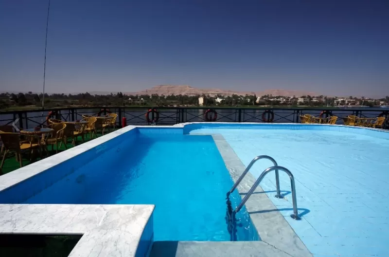 Jaz Crown Jewel Nile Cruise sun deck with sparkling pool and sun loungers overlooking the Nile